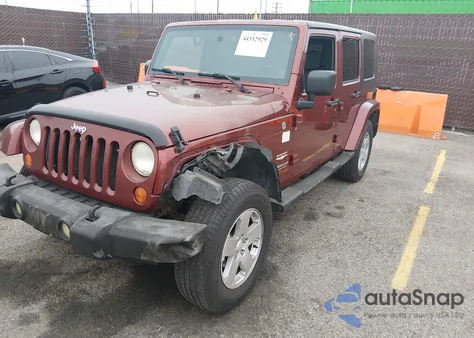 2007 Jeep Wrangler Unlimited Sahara z USA, uszkodzony, nr VIN 1J4GA59147L155674